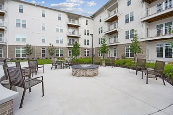 Large patio with a fire pit at The Leo Myrtle Beach, Myrtle Beach, SC